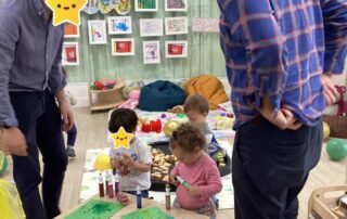 Dads and children doing arts and crafts
