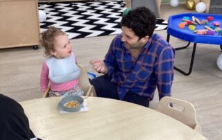 Father and child enjoying breakfast