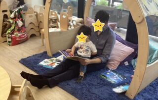 Father and child in our story corner