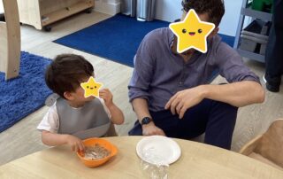 Parent and child having breakfast